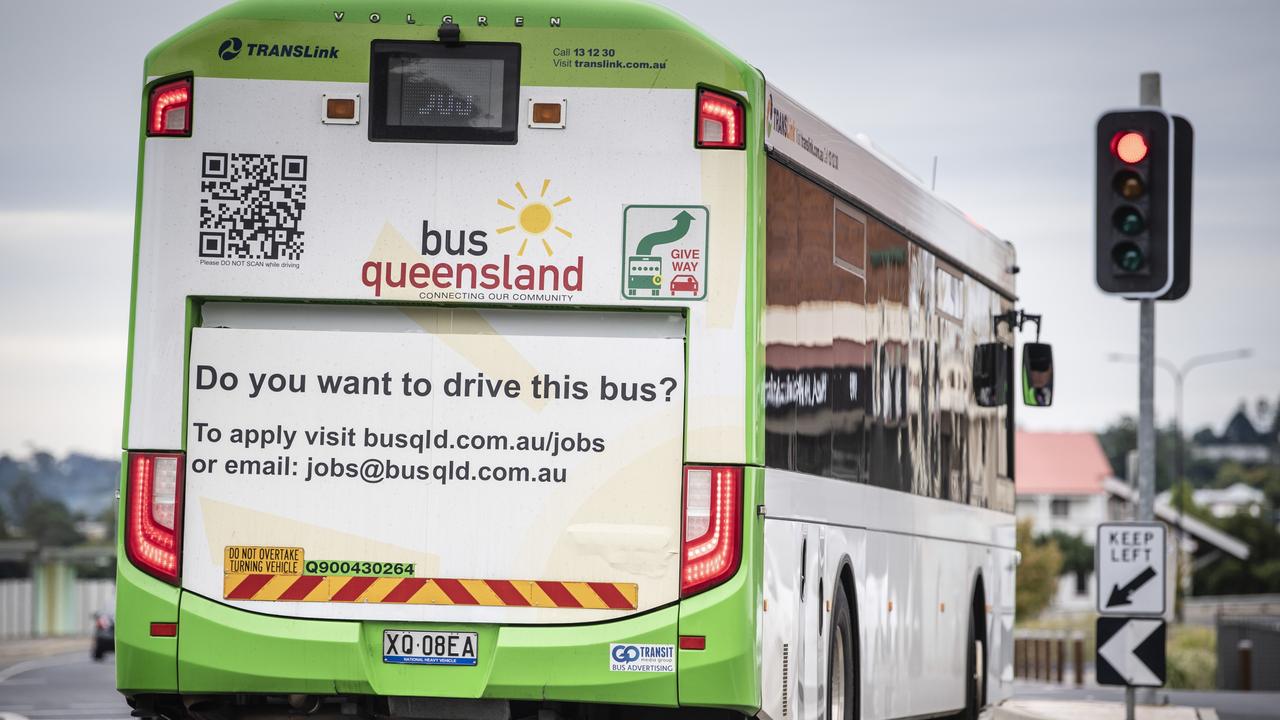 An advertisement looking for bus drivers is seen on the back of a TransLink Bus Queensland bus as it is driven on a Toowoomba CBD street. Picture: Kevin Farmer