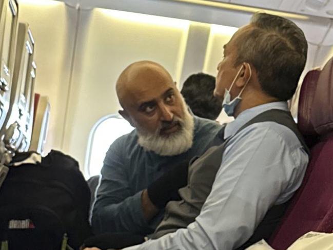 Pictured is the man at the centre of an “emergency situation” unfolding at Sydney Airport, the AFP says. , , Malaysia Airlines flight MH122 was grounded following departure earlier on Monday afternoon following an altercation involving this man. Video shows the man confronting flight attendants.,