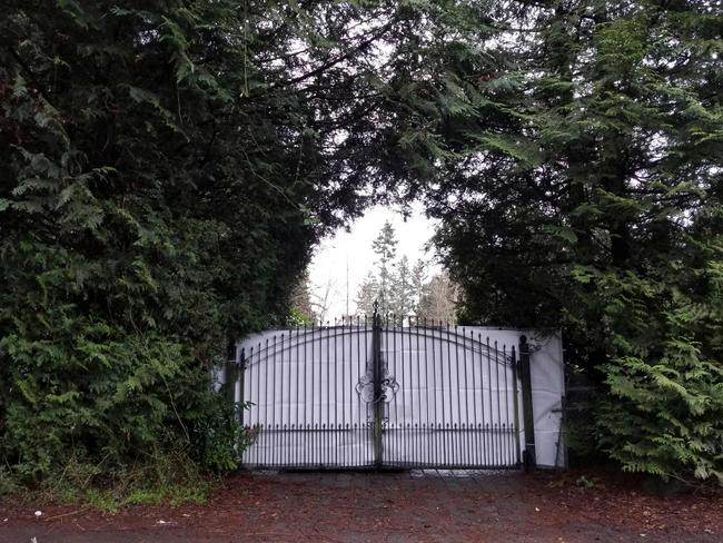 A shielded gate marking the entrance of Meghan and Prince Harry's temporary estate in North Saanich, Municipality in Vancouver Island. Picture: AFP