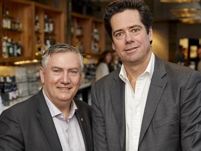 McGuire, with AFL chief Gill McLachlan, says the modern-day game has ‘got to be part of people’s lives’.