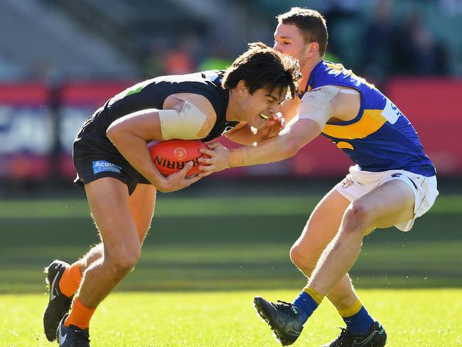 Jack Silvagni receives some attention from Jack Redden. Picture: Getty Images