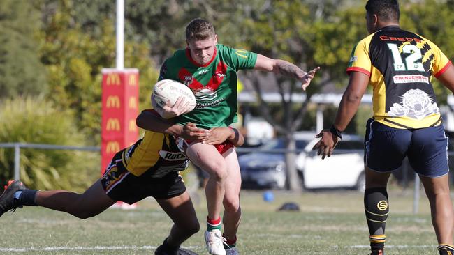 Hayden Irvine of Wynnum Manly under pressure from Ezekiel Laumantia-Tupou of Rochedale. Picture: AAP Image/Regi Varghese