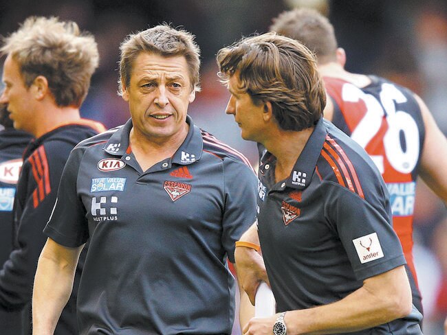 Then-Bombers assistant coach Mark Thompson with coach James Hird. Picture: Michael Dodge/Getty Images