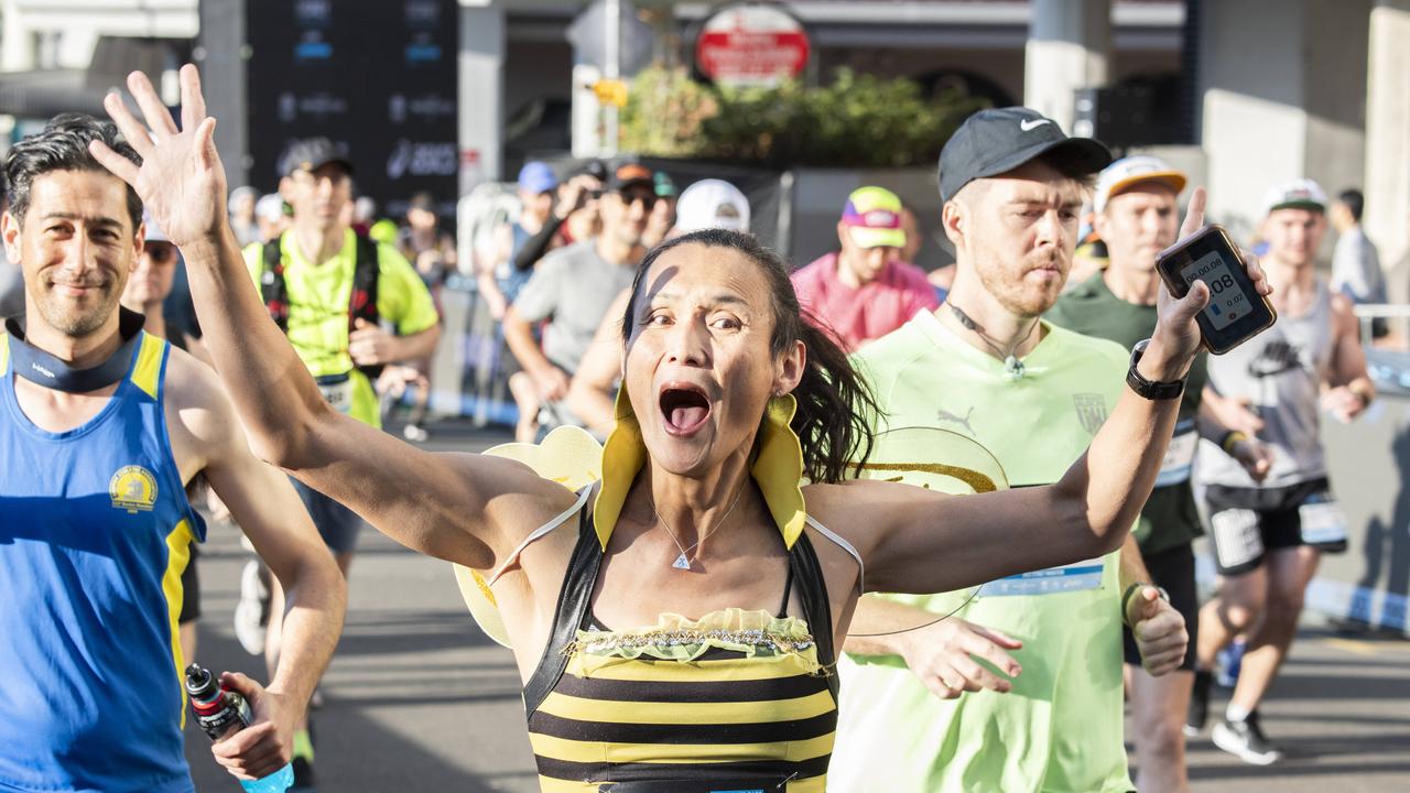 Attendees cross the Sydney Marathon starting line at Milsons Point. Picture: NCA NewsWire / Monique Harmer