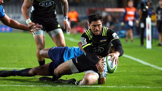 Nehe Milner-Skudder scores a try for the Hurricanes against the Blues at Eden Park. Picture: Getty Images