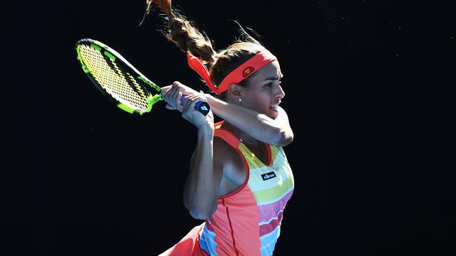 Monica Puig unloads against Sam Stosur. Picture: Getty