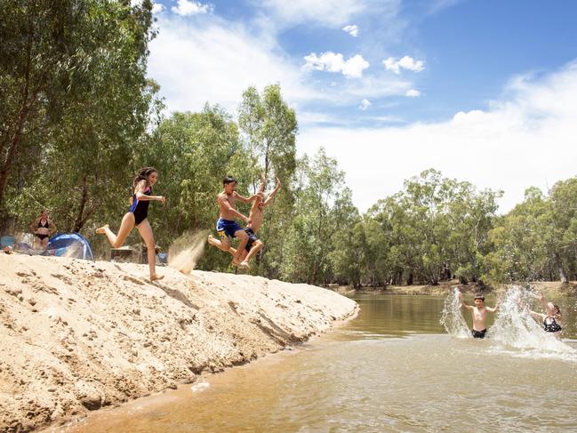 Kids cool off at Dolan's Beach on the Murrumbidgee river at Darlington Point, NSW on Sunday afternoon, January 24, 2021., , Picture: Ginette Guidolin