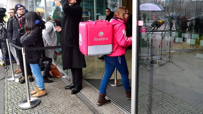 A Foodora delivery courier. Workers employed by the Apps based services could soon be paid holiday pay, super and get more cash. Picture: AFP