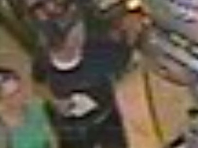 A grainy CCTV image of Lorrin in a supermarket before her disappearance.