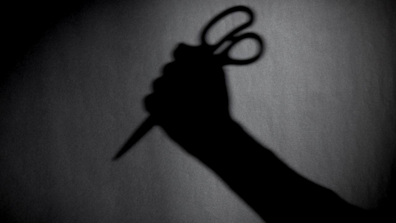 Man arrested for alleged scissor stabbing