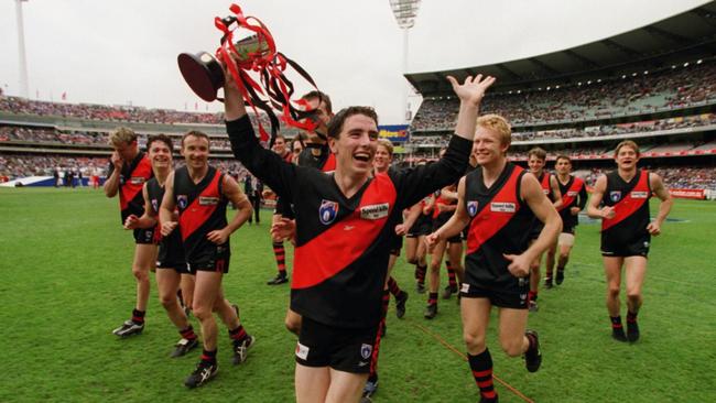 Essendon reserves players celebrate winning the 1999 Grand Final. The AFL is reportedly considering bringing back a league-wide reserves competition. Photo: Darren Tindale.