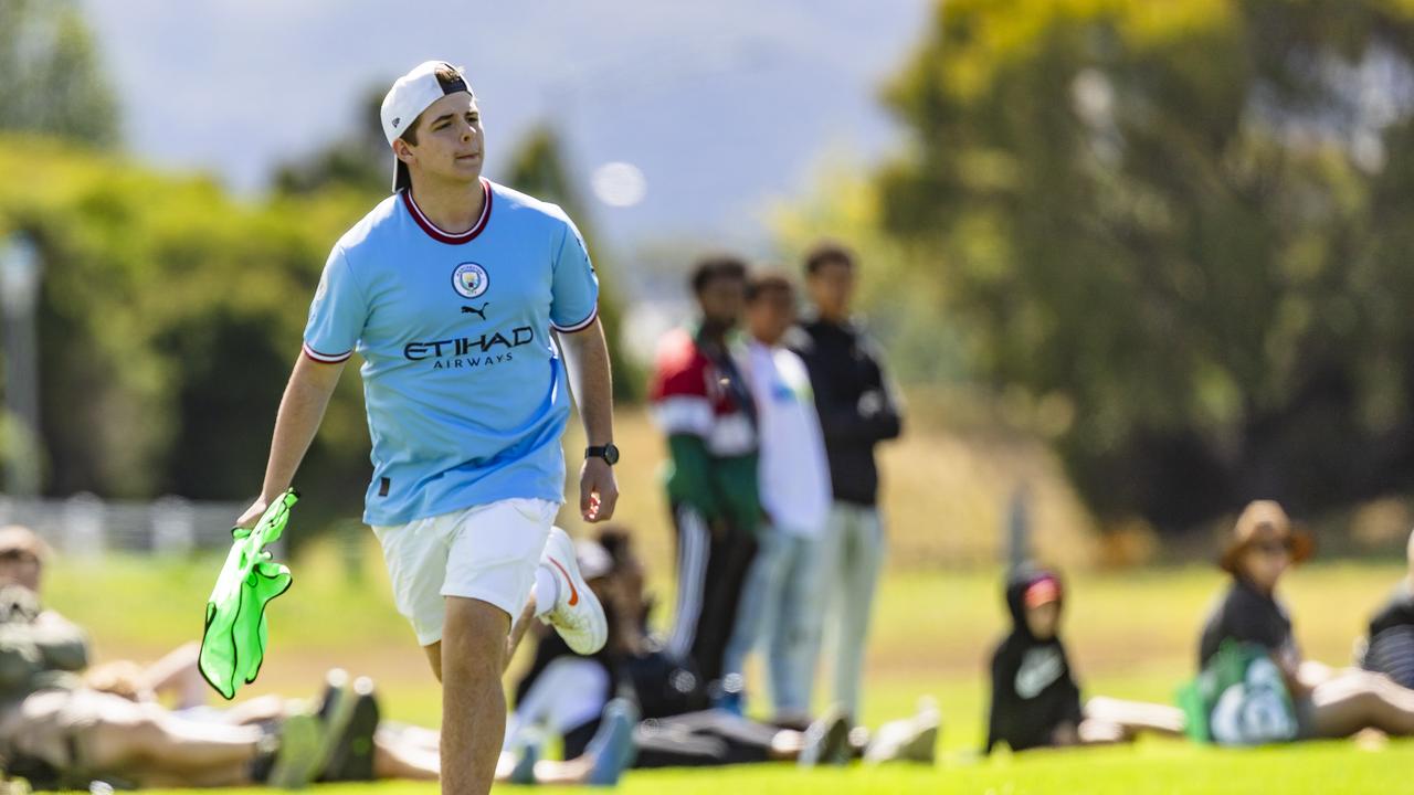 Jordan Hall volunteering with linesman duties at the Multicultural Cup on Cornelian Bay sports fields. Picture: Linda Higginson