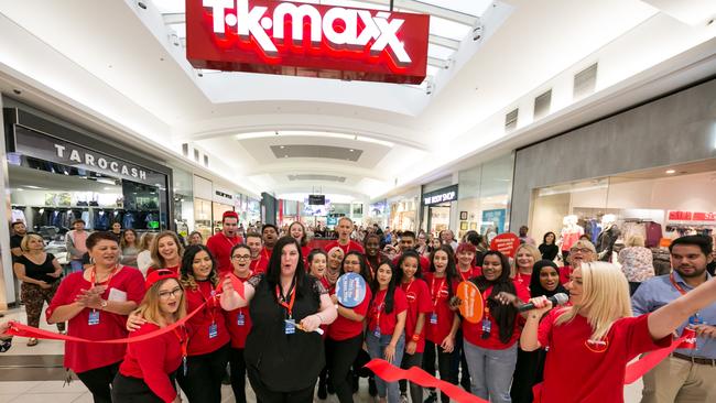 Staff cut the ribbon at the recent opening of a new TK Maxx store in Melbourne.