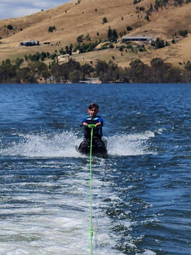 My son Cooper knee boarding for the first time at Bonnie Doon just before Christmas. Ah the Serenity! Picture: Karen Gaskett, Melton West.