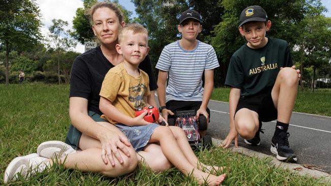 Karinya St Clair with sons Lawson, 3, and twins George and Fraser, 12. Picture: Lachie Millard