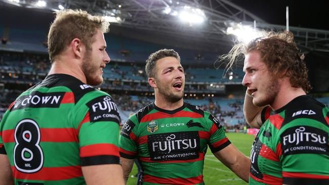 Sam Burgess (centre) wanted Tom (left) to play for him at Warrington. Picture: Brett Costello