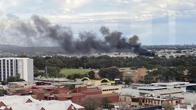 Smoke rises over the CBD from the bus fire. Picture: Supplied