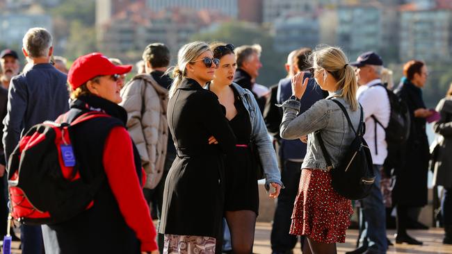 Crowds gather at the Sydney Opera House yesterday to farewell the Qantas 747. Photo: NCA Newswire/ Gaye Gerard