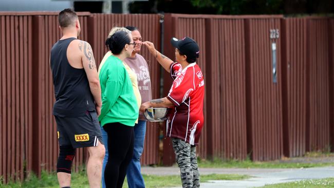 Abby and Vance Fryer with other locals hold a cleansing ceremony at the crash site after the death of Michael Warburton. Picture: David Clark