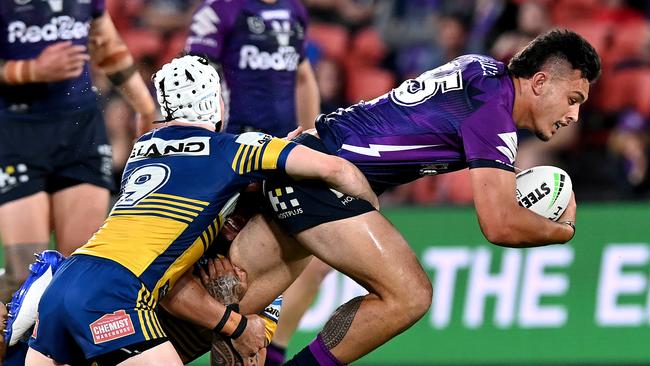 POWER ON: Gympie’s Tino Faasuamaleaui is tackled during the NRL Qualifying Final match between the Melbourne Storm and the Parramatta Eels in Brisbane earlier this month.