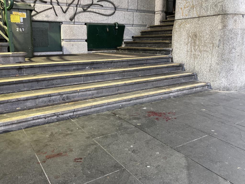 Blood remained on the footpath on Sunday morning. Picture: Brandon Demura