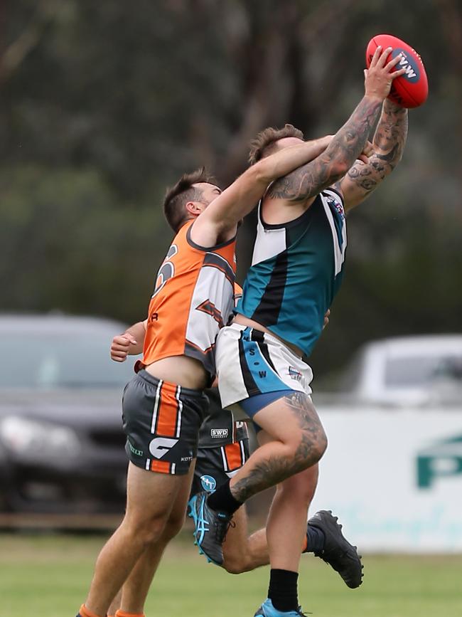 HCorey Smith, 9, CDHBU Power &amp; Thomas Plunkett, 26, RWW Giants. Picture: Yuri Kouzmin