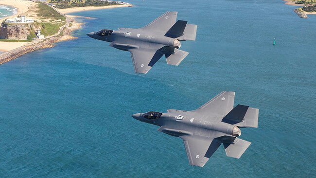 A pair of F-35A Lightning II aircraft (A35-015 and A35-024) fly in formation along the Newcastle region coastline during Exercise Lightning Storm. Picture: ADF