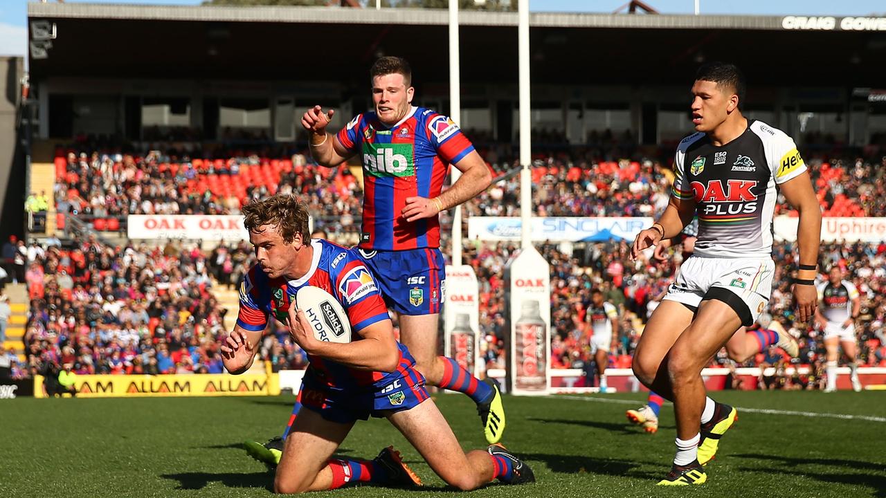 Cory Denniss scores for the Knights.