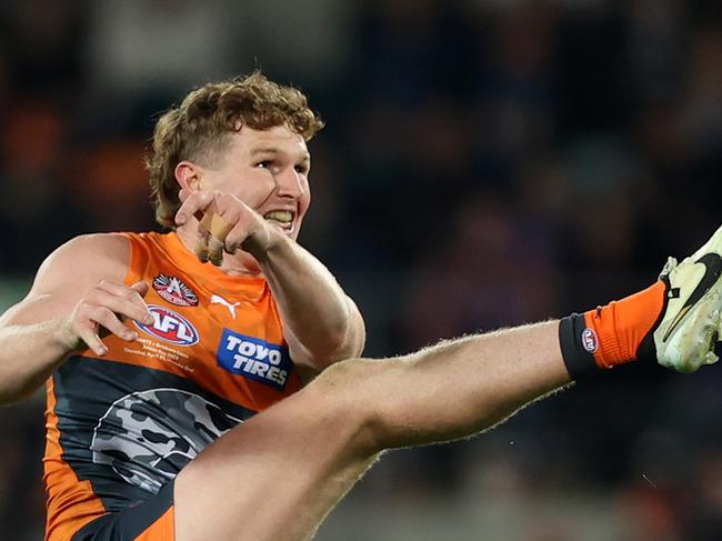 CANBERRA, AUSTRALIA - APRIL 25: Tom Green of the Giants kicks a goal during the round seven AFL match between Greater Western Sydney Giants and Brisbane Lions at Manuka Oval on April 25, 2024 in Canberra, Australia. (Photo by Jason McCawley/AFL Photos/via Getty Images )