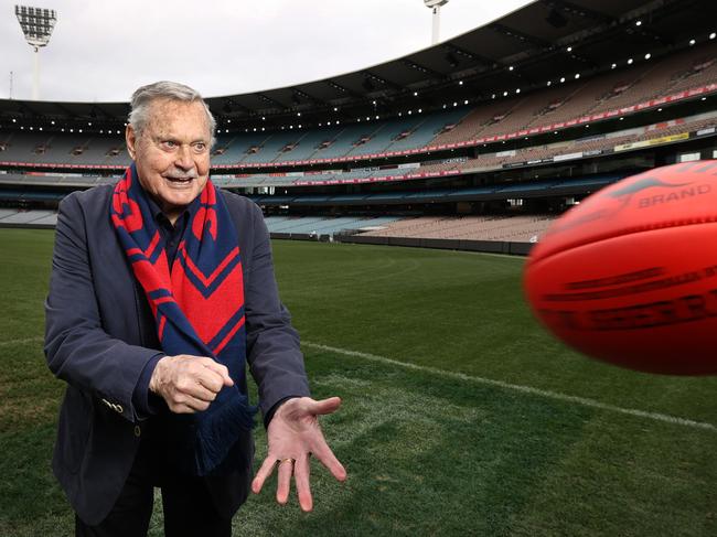 Finals are back the MCG. Football legend Ron Barassi is looking forward for his beloved Melbourne Demons to take home the 2022 Premiership Cup. Ron Barassi handballs a footy at the MCG.             Picture: David Caird