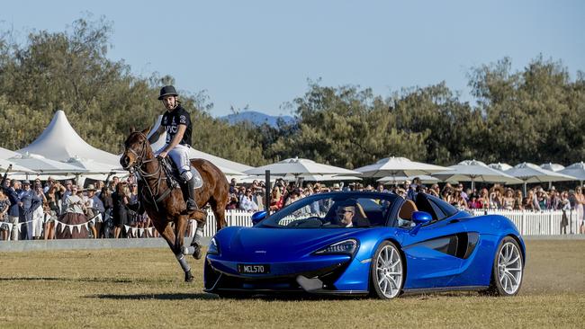 McLaren Gold Coast Polo by the Sea. Supercar driver James Courtney racing polo player Polo player Jordan Lamaison. Picture: Jerad Williams