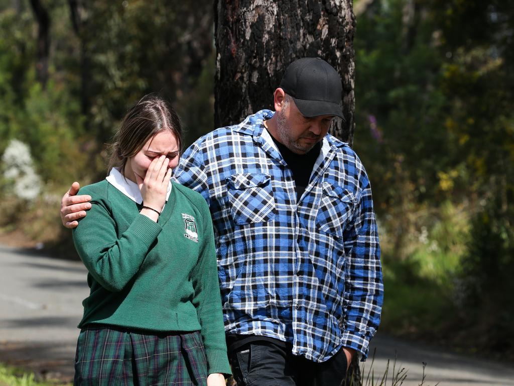 Friends of the five teens who were tragically killed in a horrific accident last night pay their respects and lay flowers at the crash site in Buxton. Picture: NCA Newswire /Gaye Gerard