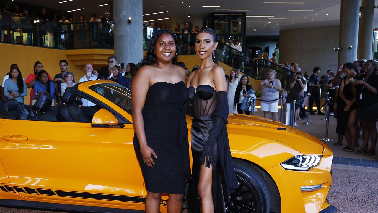 Atlanta Escott and Lawalan Linden arrive at the Peace Lutheran College formal evening at the Cairns Convention Centre. Picture: Brendan Radke