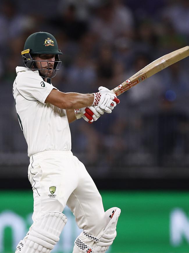 Joe Burns carves a ball through the off side during his half-century.