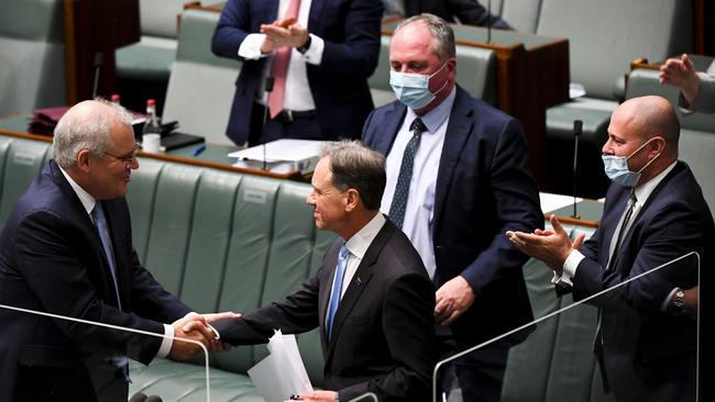 The Prime Minister thanks retiring minister Greg Hunt for his long service. Picture: AAP