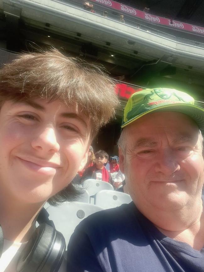 Grant (right) at the Boxing Day Test in December with his son.