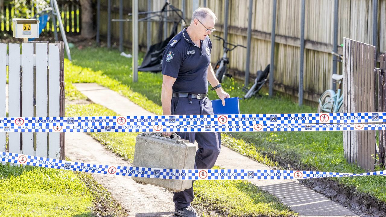 Police comb for evidence at 52 Coolum Road in Dicky Beach. Picture: Richard Walker