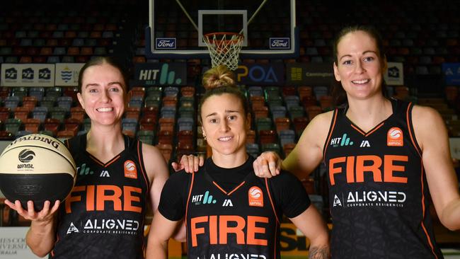 Townsville Fire co-captains Courtney Woods, Lauren Mansfield and Alicia Froling and their team mates are fired up for the semifinal game against Perth Lynx at the Firepit. Picture: Evan Morgan