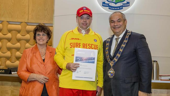 City of Gold Coast acknowledging Surf Lifesaving Queensland members who attended to a mass rescue at Tallebudgera/Palm Beach on Australia Day this year. Councillor Daphne McDonald, recipient Crane and Mayor Tom Tate . Picture: Jerad Williams