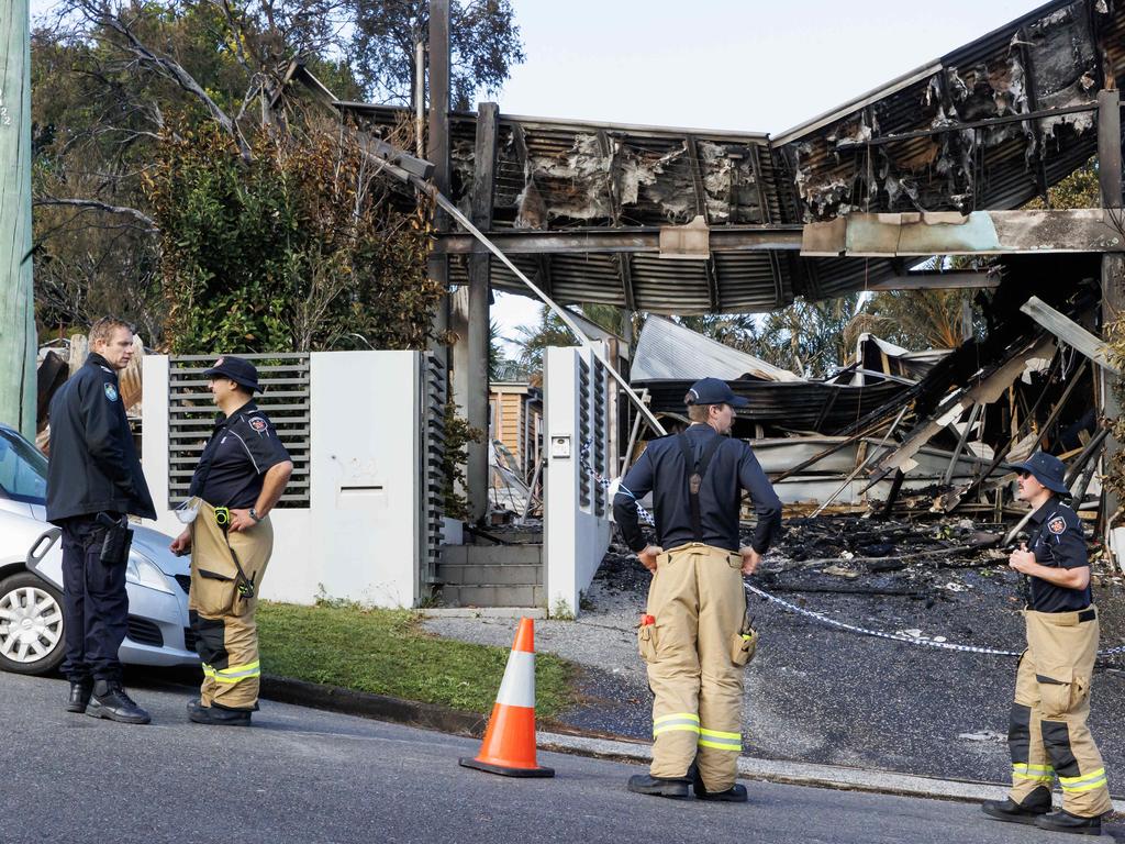 Firefighters at the scene on Sunday. Picture: Lachie Millard