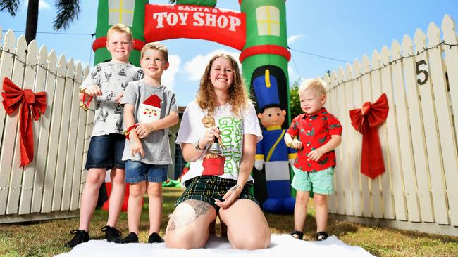 Tipahnie Clarke is encouraging Townsville to stand on their driveways on Xmas Eve and sing Jingle Bells to help launch Santa's sleigh. Pictured with Riley 8 and Hayden Schulze 5 and Henry Peirce 3. Picture: Alix Sweeney