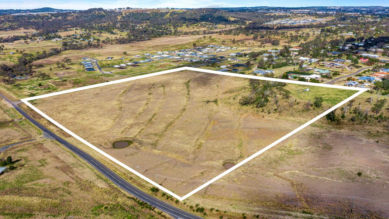 Land in Cotswold Hills slated for a new subdivision by Edward Hodge.