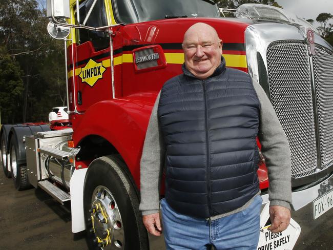 Lindsay Fox celebrates 60 years of Linfox with live displays at the Australian Automotive Research Centre in Anglesea. Lindsay Fox happily celebrates 60 years of his trucking empire beside one of his latest fleet trucks.    Picture: David Caird