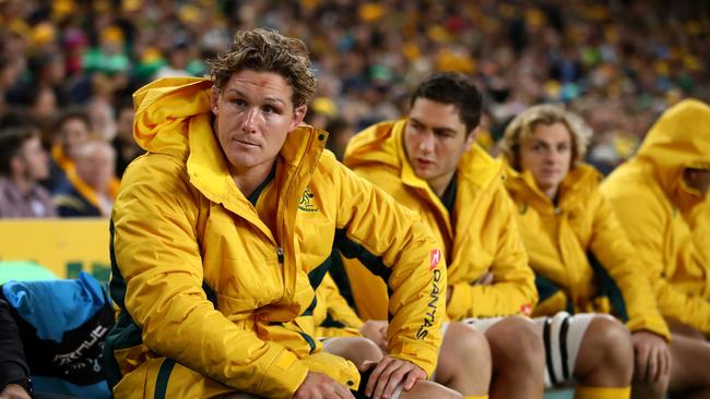 Wallabies captain Michael Hooper sits on the bench after coming off with a hamstring injury on Saturday. Picture: Getty Images