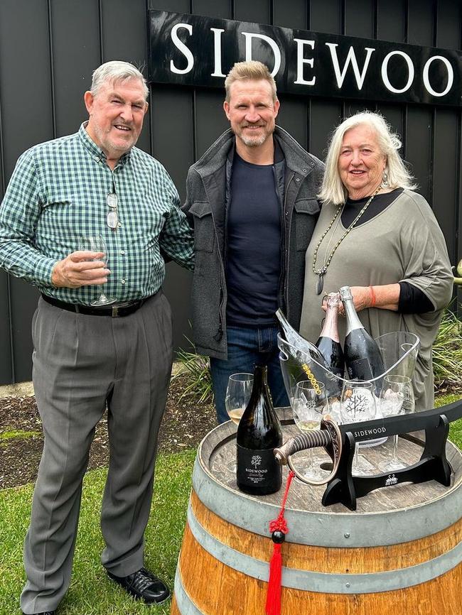 Nathan Buckley says family and football have always been the two most important things in his life Pictured with his dad Ray Buckley and mum Karen Buckley. Picture: Supplied