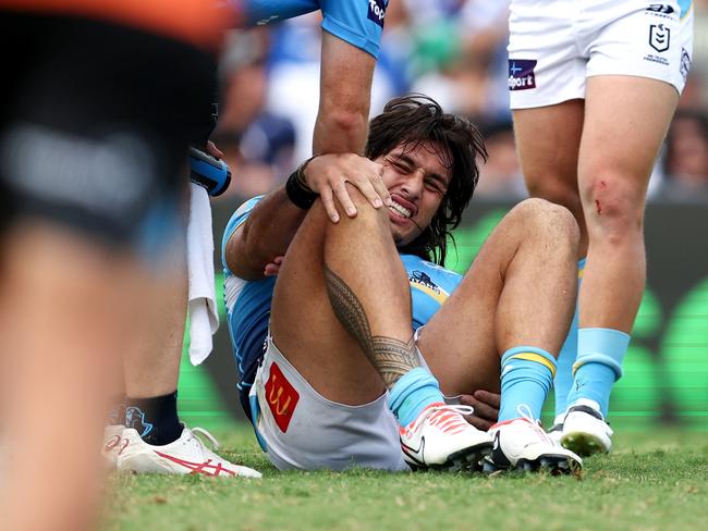 Tino Fa'asuamaleaui down with a knee injury. Picture: Brendon Thorne/Getty Images