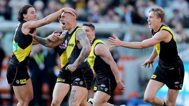 Richmond celebrate Richmond Tigers and the GWS Giants at the MCG on September 28, 2019 in Melbourne, Australia. Picture: Michael Klein.