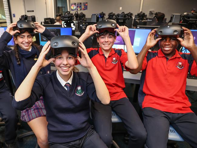 Hundreds of Victorian state schools receive more money per student from the government than the top private schools funded by parents, according to a new analysis of federal data. McKinnon Secondary College East Campus year 9 students Maleesha 14, Harley 15, Sophie 14, Elliot 14 and Ben 14 enjoying visual reality technology in the VR room.                      Picture: David Caird