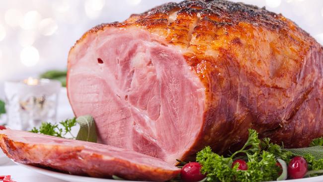 It’s never been easier than now to support Australian farmers when choosing a ham to bake for Christmas. Picture: Getty Images