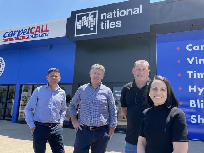 Knight Frank sales and leasing executives Dan Place and Mark Fitzgerald with National Tiles and Carpet Call co-owners Dean and Tamara Parfrey. Picture: Leighton Smith.